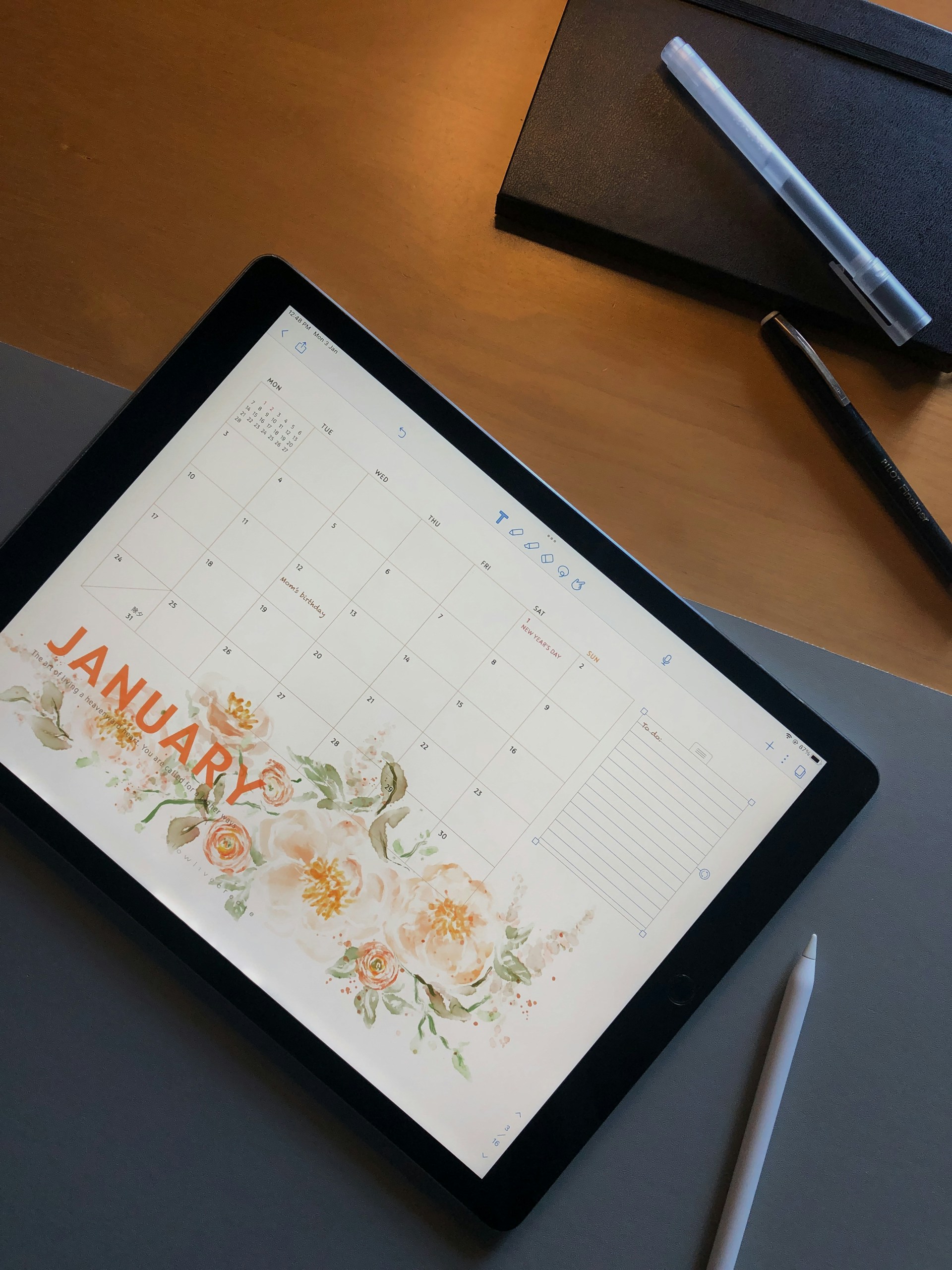 January shown on a blank calendar with a blank list of goals beside it